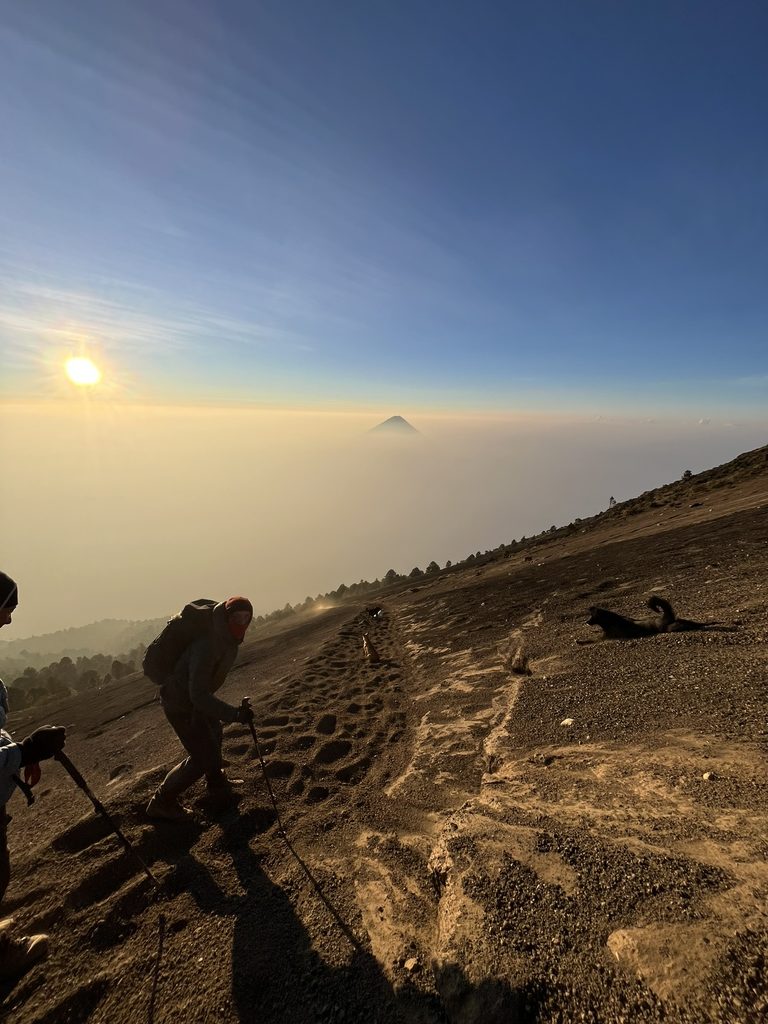 The steep descent from the summit of Volcan Acatenango with Volcan de Agua in the distance