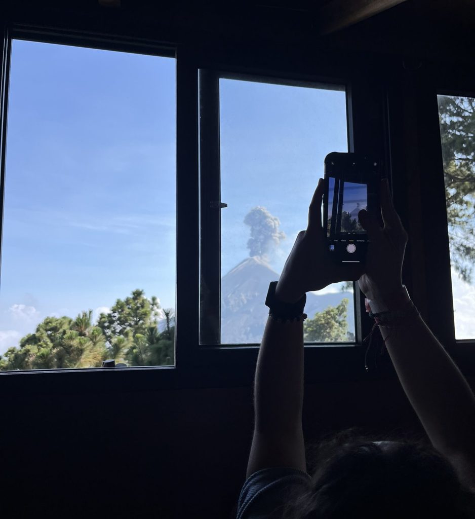 View of erupting volcano from inside the hut on Volcan Acatenango 